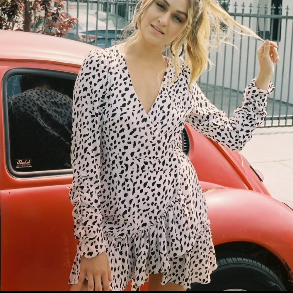 Light pink and black spotted wrap dress